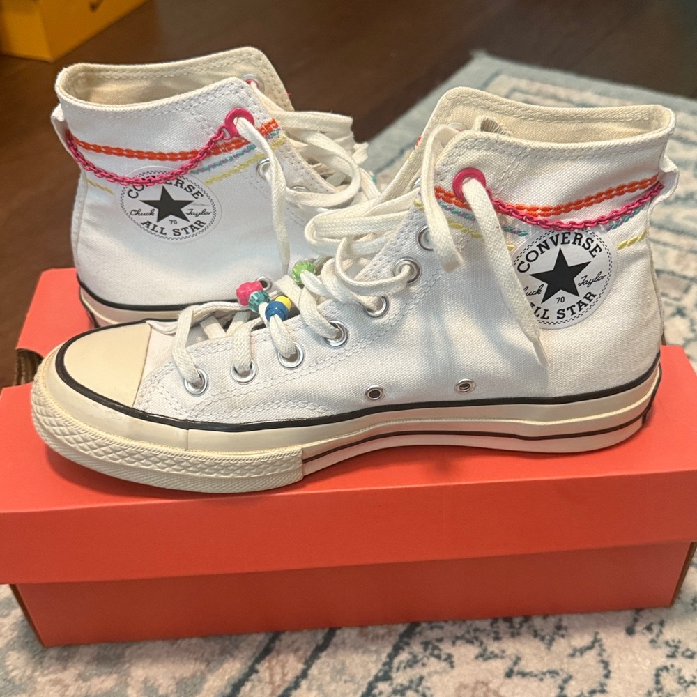 Converse White High-Tops with Colorful Details